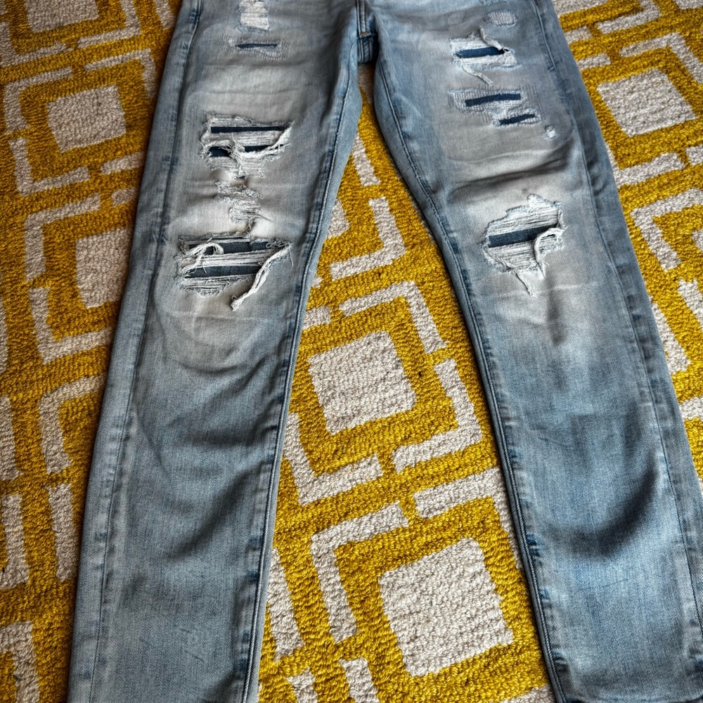 Stylish Black and Light Blue Distressed men’s Jeans - Picture 5 of 16